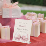 Pink bow cream beige birthday party welcome pedestal sign<br><div class="desc">A cream,  beige background decorated with a large pink bow.   Personalise and add a name and age.</div>