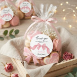 Pink Bow She's Tying the Knot Bridal Shower Thanks Classic Round Sticker<br><div class="desc">Add a thoughtful finishing touch to your celebration with this pink bow “She’s Tying the Knot” bridal shower thanks classic round sticker. Featuring a delicate ribbon bow and elegant script typography, this design creates a soft and feminine aesthetic perfect for romantic, coquette, and modern bridal shower themes. Ideal for sealing...</div>