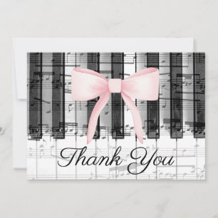pink bow thank you calligraphy on music piano