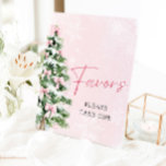 Pink Bows Christmas Tree Winter Baby Shower Favour Pedestal Sign<br><div class="desc">Add a touch of sweetness to your baby shower with this Pink Bows Christmas Tree Favours Sign! 🎀🎄 Featuring an adorable pink bow and a festive Christmas tree, this charming sign is perfect for leading your guests to their special treats. 💕 The soft pink hues and whimsical winter design create...</div>