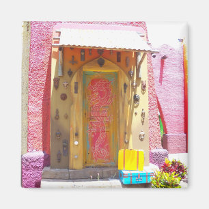 Pink building collects doorknockers magnet