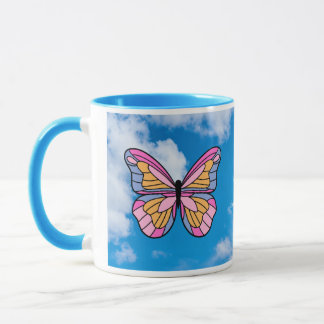 Pink butterfly blue handle mug