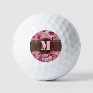 Pink camouflage golf balls