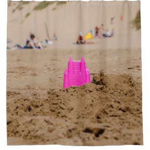 Pink castle toy in shore at daytime shower curtain