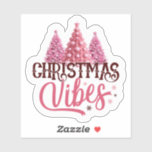Pink Christmas Tree Sticker<br><div class="desc">This cheerful sticker showcases three pink Christmas trees, adorned with shiny ornaments and delicate snowflakes. The playful text Christmas Vibes adds a joyful spirit, making it perfect for holiday greetings, decorations, or festive crafts.</div>