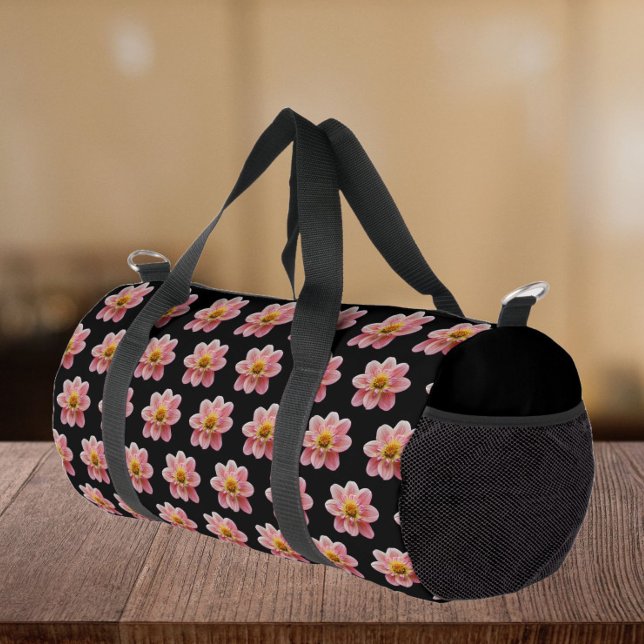 Pink Collarette Dahlia Floral Pattern on Black Duffle Bag (In Situ)