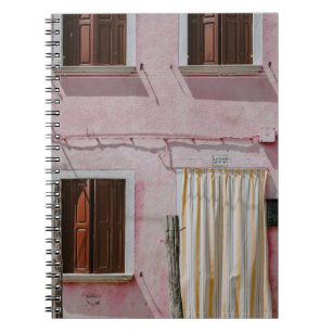 PINK CONCRETE HOUSE WITH THREE WINDOWS AND ONE DOO NOTEBOOK
