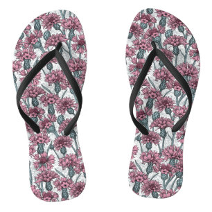 Pink cornflowers, wild flowers on white jandals