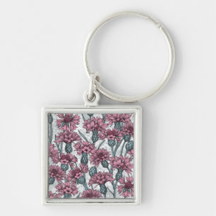 Pink cornflowers, wild flowers on white key ring
