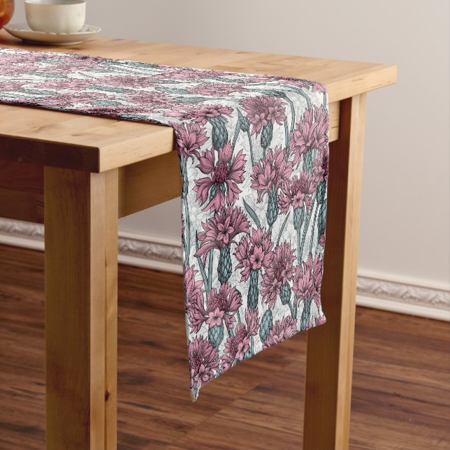 Pink cornflowers, wild flowers on white short table runner (In Situ)
