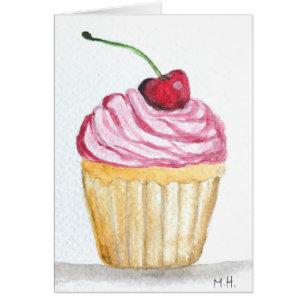 Pink cupcake with cherry
