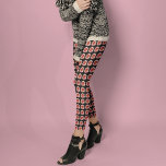 Pink Daylily Floral Pattern on Black Leggings<br><div class="desc">Stretchy,  fashionable leggings that feature the photo image of a lovely,  pink Daylily bloom on a black background and printed in a repeating pattern. A lovely,  floral design! Select your leggings size.</div>