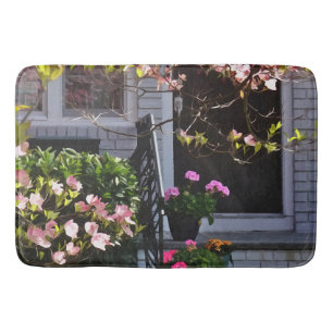 Pink Dogwood and Pots of Geraniums Bath Mat