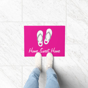 Pink doormat with cute beach flip flops design