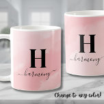 Pink Elegant Girly Monogram Coffee Mug<br><div class="desc">This stylish and trendy monogram mug features a blush pink watercolor background, with a personalised initial and script calligraphy name elegantly displayed below. The soft, feminine design exudes a girly and cute vibe, making it a perfect accessory for your morning coffee or tea. Whether you're gifting it for a birthday,...</div>
