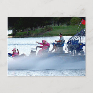pink fire fighters on airboat in florida postcard
