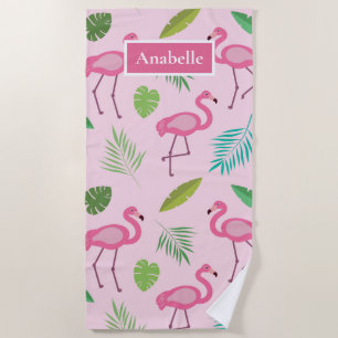 Pink flamingo and tropical leaves personalised beach towel