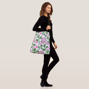 Pink floral pattern with green leaves crossbody bag