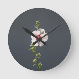 Pink Flower Mallow green leaves on dark grey Round Clock