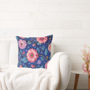 Pink flowers on vibrant blue pattern cushion