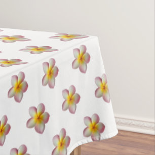 Pink Frangipani Plumeria Flowers on White Tablecloth