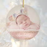 Pink Gold Glam Custom Girl Baby Photo Personalised Ceramic Tree Decoration<br><div class="desc">This elegant ornament is a great way to show off your favourite photo of the new baby girl in the family. Easily replace the sample photo with your own, then personalise it by adding baby's name in white handwriting script over blush pink and faux gold foil brushstrokes. And ideal gift...</div>