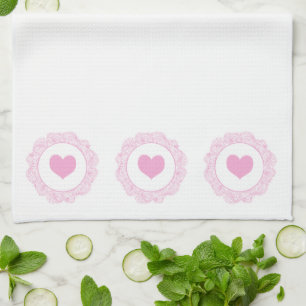 Pink heart motif tea towel