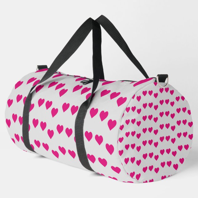 Pink hearts on grey duffle bag (Left Corner)
