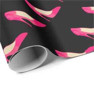 Pink heels on black wrapping paper