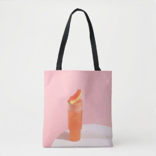 Pink ice cream on cone tote bag