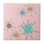 Pink Iconic Atomic Starbursts Ceramic Tile<br><div class="desc">This Pink Iconic Atomic Starbursts Small Ceramic Tile pattern features iconic atomic starbursts. That’s right! The old school, First Lady Pink coloured background with gold speckles is the perfect backdrop for the vibrant turquoise, soothing celery, and kitschy pear green coloured circles. The spots of colour are sporadically placed in various...</div>