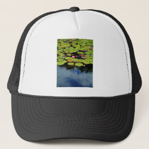 Pink lotus in Rain Trucker Hat