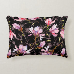 Pink magnolia flowers on a twig pattern decorative cushion