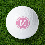 Pink Monogram Personalised Golf Balls<br><div class="desc">Tee off in style with our custom golf balls, personalised with a bold minimalist monogram initial in a modern circle frame. Choose from a wide selection of colours to create a design that’s uniquely yours. Perfect for gifting, these golf balls make a thoughtful and practical present for Christmas, Father’s Day,...</div>