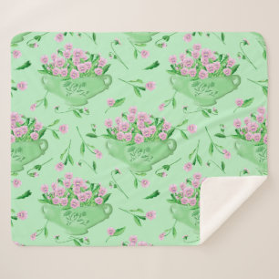 Pink pansies green bowl and background sherpa blanket