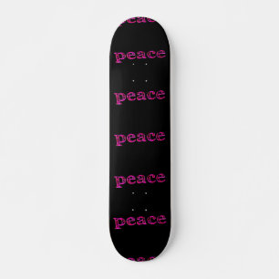 pink peace on black skateboard