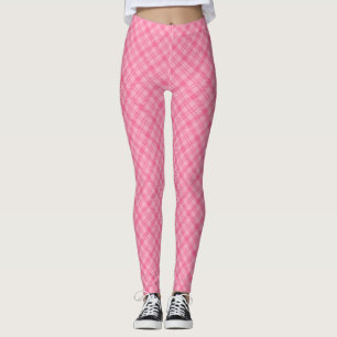 Pink plaid leggings displayed front view, worn 