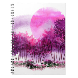 pink, purple silhouette of trees against the backg notebook