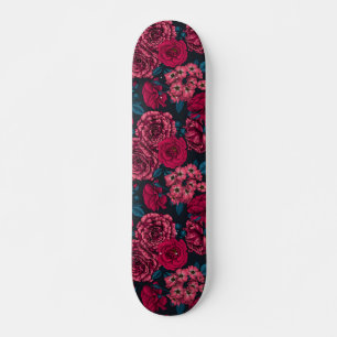 Pink, red and bi-colour roses with blue leaves on  skateboard