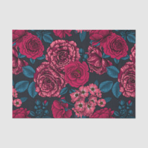 Pink, red and bi-colour roses with blue leaves on tissue paper