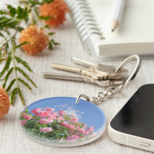 Pink rose bush under blue sky, custom key ring