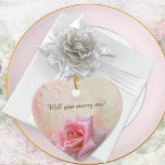 Pink Rose Engagement Heart  Ceramic Tree Decoration<br><div class="desc">Elegant ceramic "marry me" keepsake ornament features a simple gorgeous pink rose on a misty water colour pink background with dewdrops. Perfect accessory for a marriage proposal before choosing rings . Just edit the text front and back in the easy Zazzle text editor.</div>