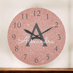 Pink Rose Gold Sparkle Glitter Monogram Name<br><div class="desc">Pink - Rose Gold Sparkle Glitter Monogram Name and Initial Serving Wall Clock that can be used at home,  office or in a beauty salon business for Nails,  Microblading,  Eyelash Extensions (Lashes),  Hair or Makeup. The Wall Clock makes the perfect gift for someone who loves pink sparkle glitter.</div>