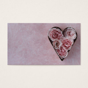 pink roses in a heart-shaped cookie cutter