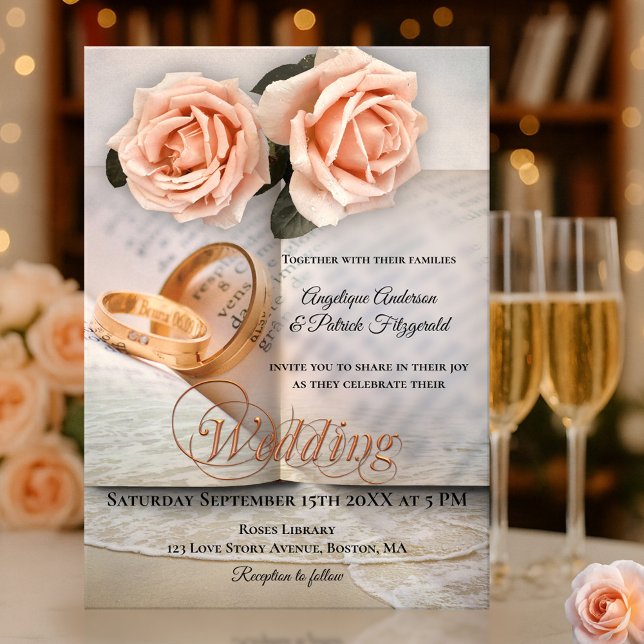 Pink Roses Love Story Book Wedding Invitation (Wedding invitation featuring roses on a book and wedding band background with a soft beach overlay)