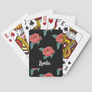 Pink roses on black playing cards