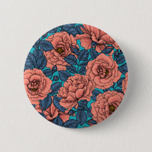 Pink roses with blue leaves on blue 6 cm round badge