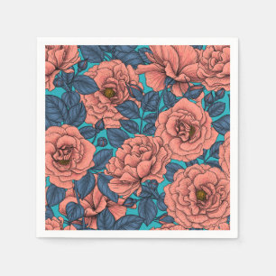 Pink roses with blue leaves on blue napkin