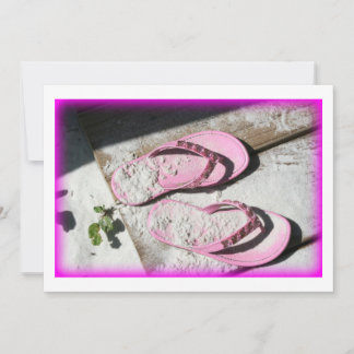 Pink sandy flip flop sandals on Florida beach