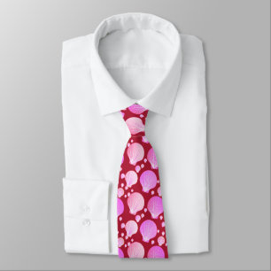 Pink seashells on a burgundy background tie